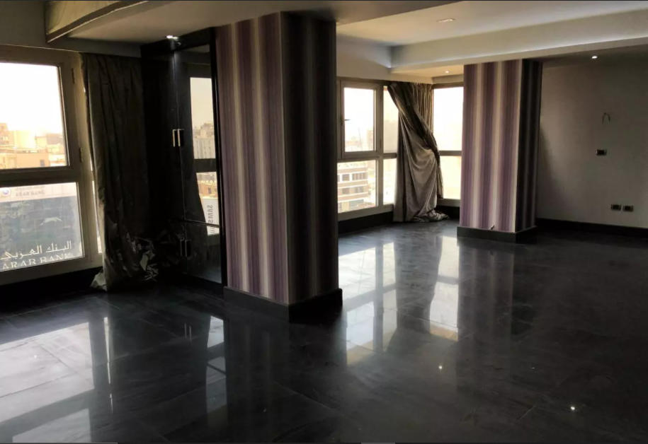 Apartment for rent in Mohandessin, buildings 280 m, on Jamiat El Dowal Street, on the corner of Jazirat Al Arab, 12th floor.
The apartment area is 280 square meters, super luxe finishing, and it consists of 4 bedrooms and 4 bathrooms, marble - parquet - mirrors - internal air conditioners - large reception - large kitchen - salon room - maid room with private bathroom and laundry room. The area was established and built in the early fifties of the last century and was built on agricultural land in addition to a large area of ​​villas. In 1970 its population increased significantly, its features differed, and the villa district was transformed into apartment buildings filled with people. In the past ten years, engineers have become the most expensive area for real estate and buildings, and the price per square meter has reached 12,000 Egyptian pounds or more, and the increase in real estate prices is due to the most important features of that city: its distinguished location.